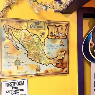 a map of mexico and a sign for a restaurant