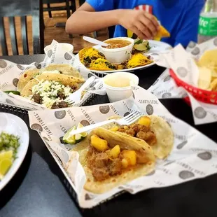 a woman eating at a restaurant