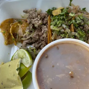 a white styrofoam container filled with food