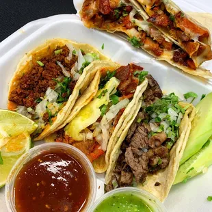 a plate of tacos and guacamole