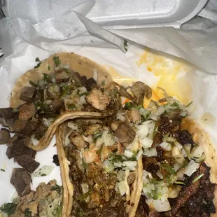 already ate 2 tacos but the ones pictured are lengua, asada and adobada.
