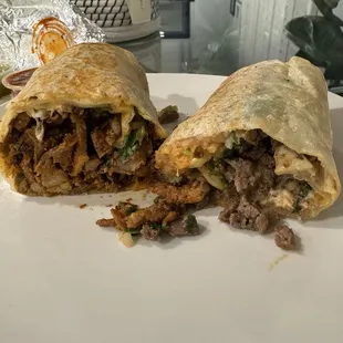 Al pastor to the left. Carne asada to the right. Both very good but al pastor is my fav. So good here