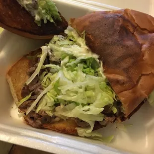 Just how I like my torta! It's carne asada, lettuce, frijoles, mayo and the bread.