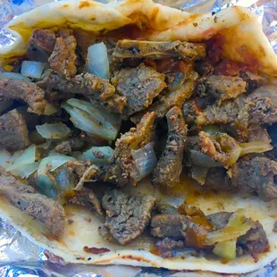 Got my taco packed with asada, onions and beans!