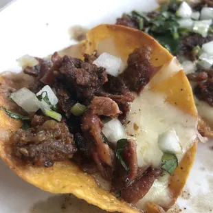 Cheese tripa tacos, extra crispy tripa and crispy tortilla