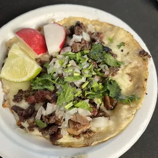 Crispy cheese carne asada taco
