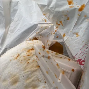 Wet burrito sauce leaked in to-go bag.