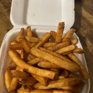 french fries in a styrofoam container