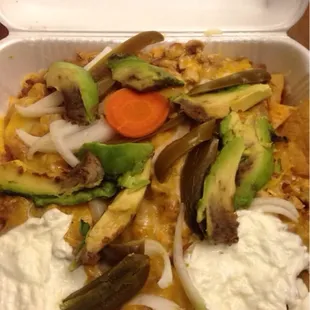 Chicken nachos my fav! Forgive the pic, had to make it home across town