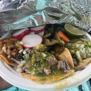 Lengua ($3.50) y pastor ($3) with salsa verde