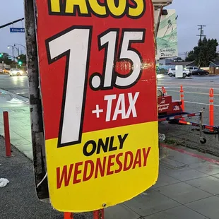 a taco&apos;s 1 - 15 tax sign