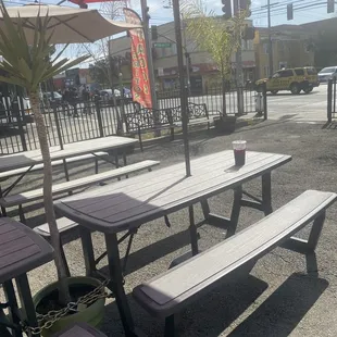 Several tables for sit down dining.