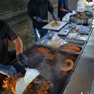 Wide assortment of meats. Only downside is no carnitas but the pastor makes up for it. These guys work their ass off.