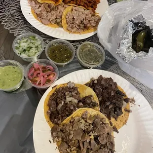 Ranked best to less - Cabeza, Lengua, Al pastor, Suadero. $2/for all that meat! Grilled jalapenos were on fire too !