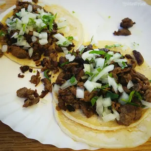 2 carne asada tacos. They have a bar of things you can top them with. Yum!