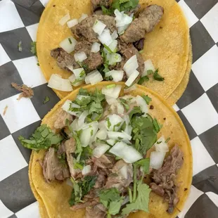 Bistek and carnitas tacos