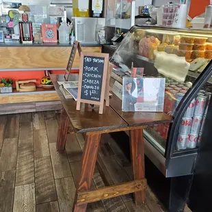 a table with a sign on it