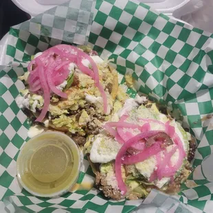 Grilled Meat, Avocado, onions, beans, cheese, and startch