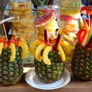 pineapples with fruit in them