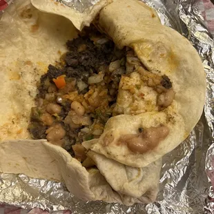 Super burrito. It has a lot of weight behind it. Watch out for their hot sauce.