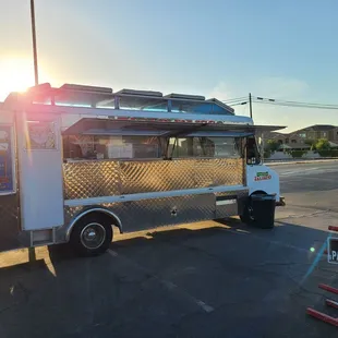 a food truck parked in a parking lot