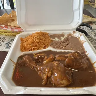 a meal in a styrofoam container