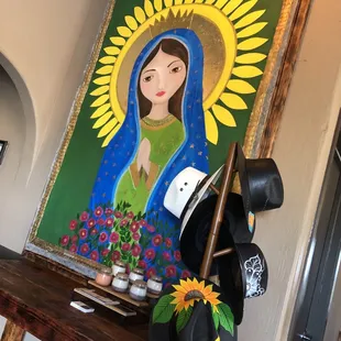 a painting of the virgin of guadalupe