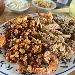 Custom order meat plate. From left- Al pastor, carnitas, carne asada. Plus shrimp.