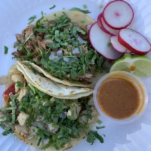 Carnitas and Pollo tacos with the most amazing salsa