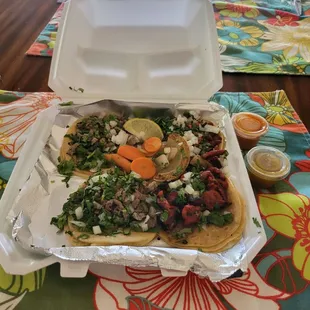 a taco in a takeout container