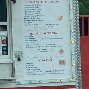 a menu on a food truck