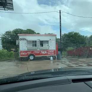 a food truck in the rain