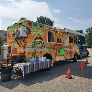 a taco truck parked in a parking lot