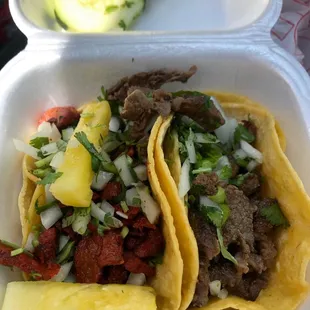 Delicious tacos! Al pastor on the left and asada on the right