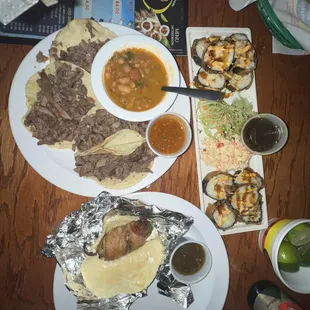 Mini Tacos with Charro Beans . Jalapeño wrapped with bacon  . California Roll Sushi