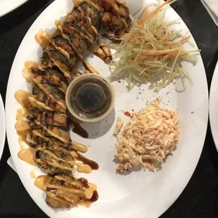 Villarreal roll. Crab salad and veggies soaked in vinegar plus soy sauce on the side.