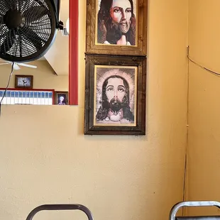 a man&apos;s face on the wall