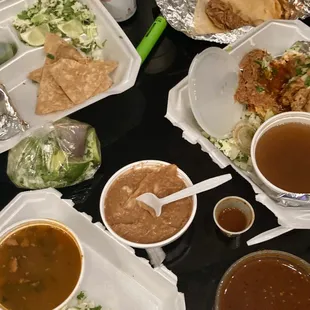 Birria caldo, tacos &amp; quesobirria. Beans, chips and salsa.  I love to over-order here! Lol.