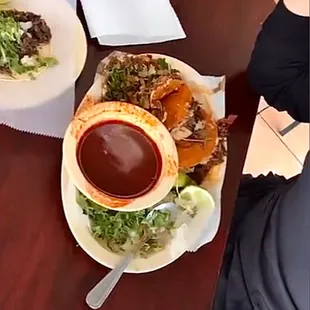 Tacos de Birria with caldito and un Taco de barbacoa