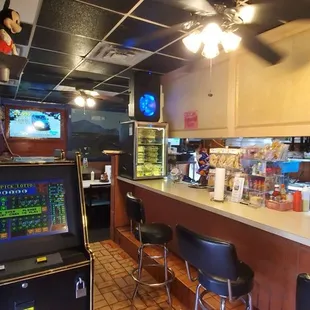 Bar area leading to dining room on left