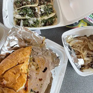 Pastor Torta was amazing !! With Steak Tacos on flour tortillas and a side of grilled onions