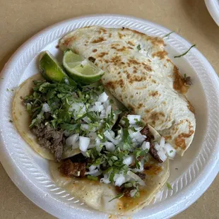 Bistek taco, pastor taco, and quesadilla