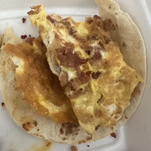 Bacon and egg.. I assume they just throw the egg on the griddle and fold it