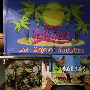 a taco truck parked in front of a building