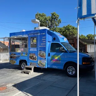 a blue food truck