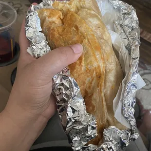 Chorizo Breakfast Burrrito eggs and potatoes and mild cheddar cheese