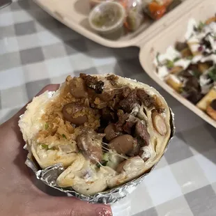 Inside of the 15&quot; burrito- carne asada, sour cream, cheese, beans, onions and cabbage?