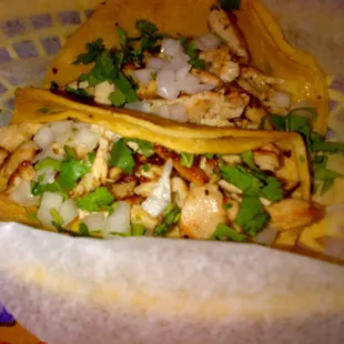 Chicken tacos on corn tortillas.  Tasty tacos but terrible customer service!