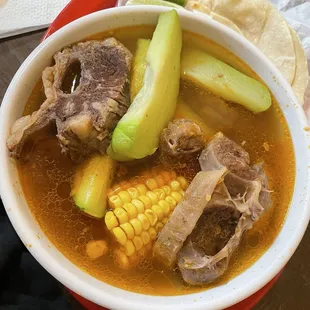 Caldo de res: great! lots of meat, potatoes, corn, zucchini, squash, &amp; carrots, with rice, tortillas, salsa, onions, &amp; limes.