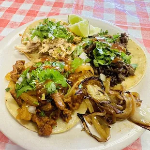Pollo, asada and Al pastor taco
